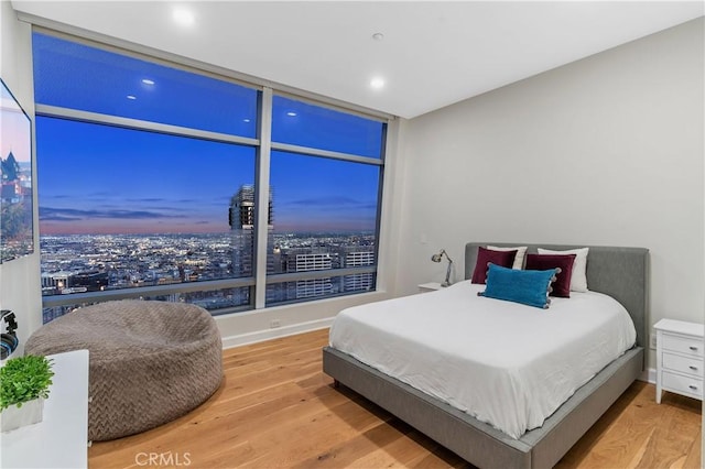 bedroom featuring hardwood / wood-style flooring