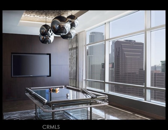 game room with an inviting chandelier