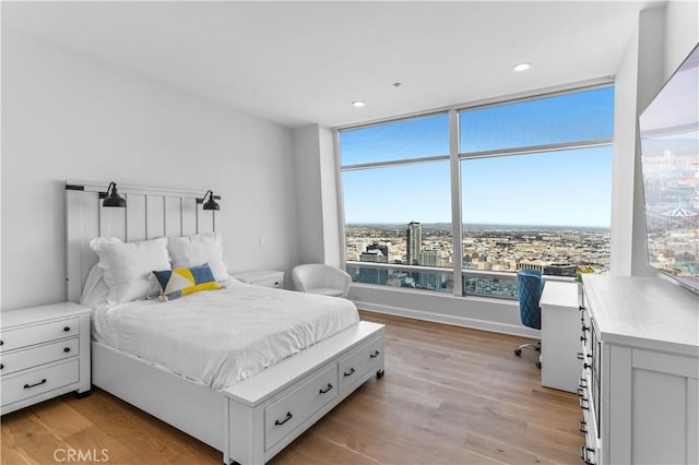 bedroom with light wood-type flooring