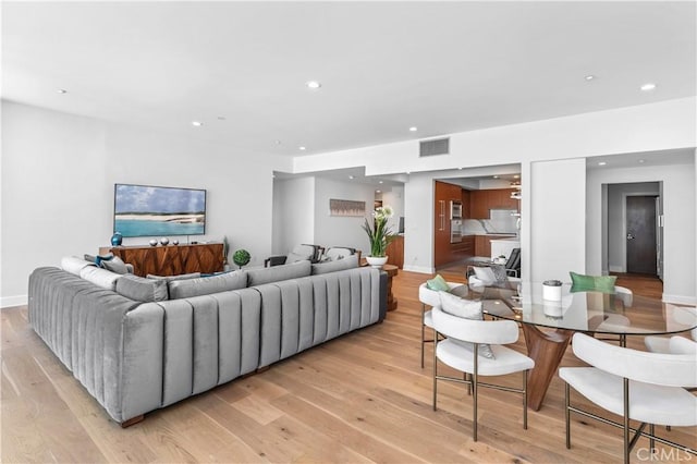 living room with light wood-type flooring