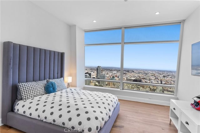 bedroom with light wood-type flooring