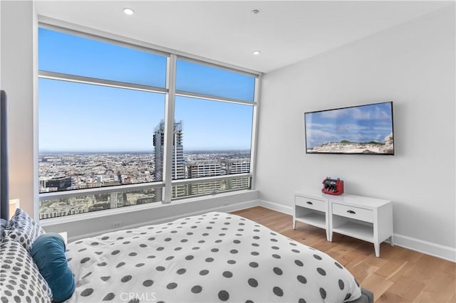 bedroom featuring hardwood / wood-style flooring