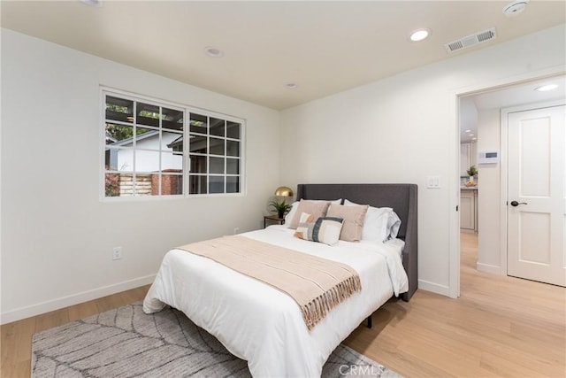 bedroom featuring light hardwood / wood-style flooring