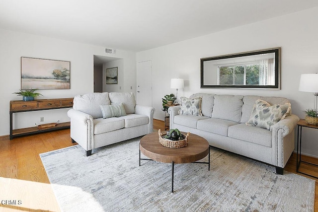 living room with hardwood / wood-style flooring