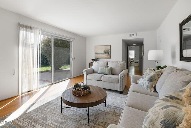 living room with hardwood / wood-style floors