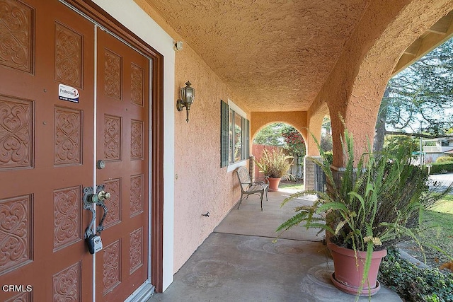 view of patio featuring covered porch