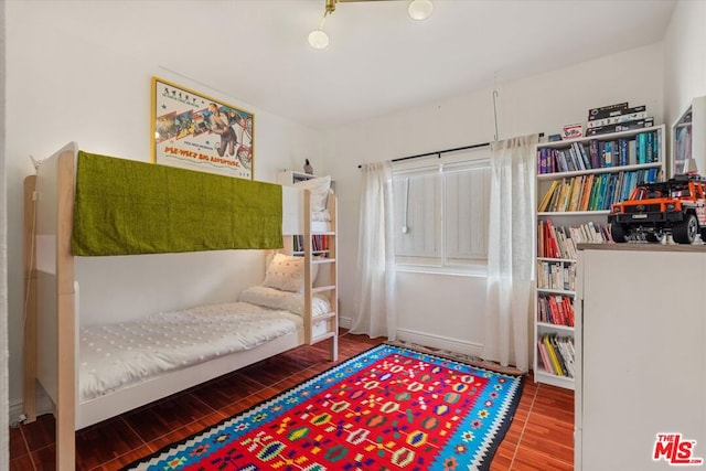 living area with hardwood / wood-style floors