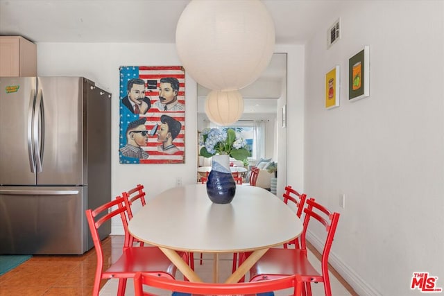 view of tiled dining area