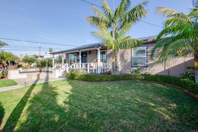 view of front of home with a porch and a front lawn