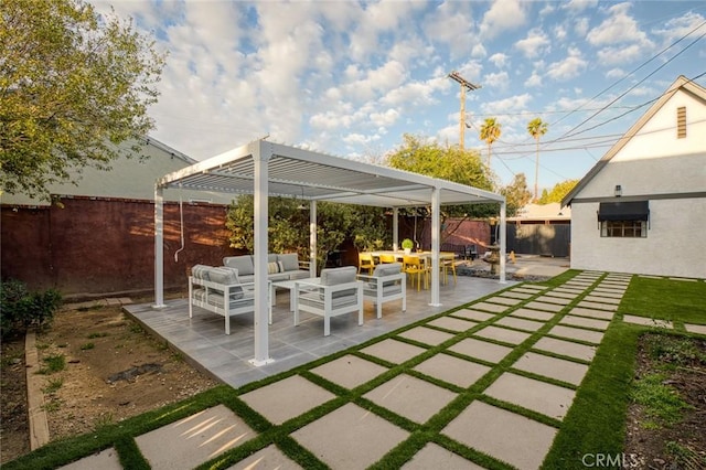 view of patio / terrace with an outdoor hangout area and a pergola