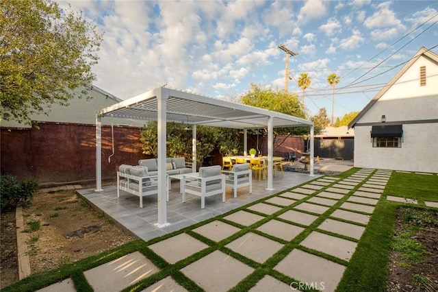 view of patio with a pergola, a fenced backyard, and an outdoor hangout area