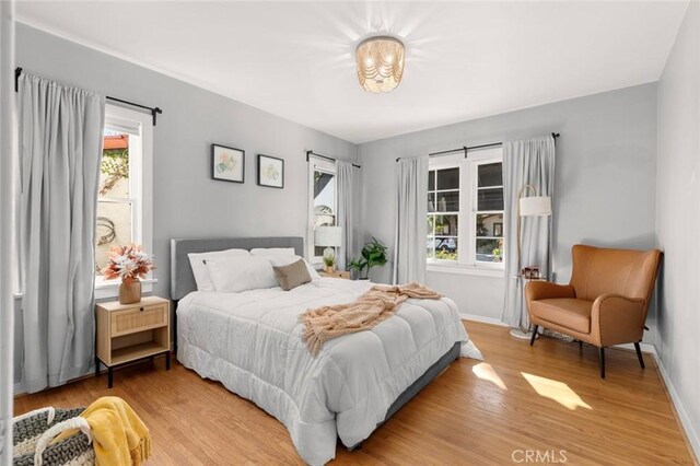 bedroom featuring hardwood / wood-style floors