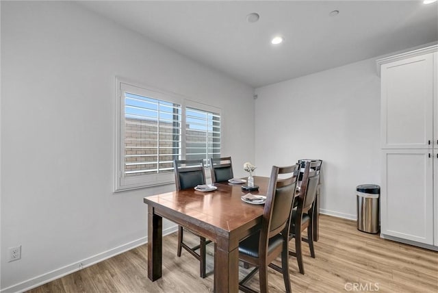 dining area with light wood-type flooring