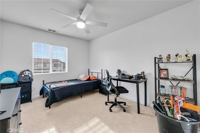 bedroom with light carpet and ceiling fan