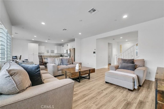 living room with light wood-type flooring