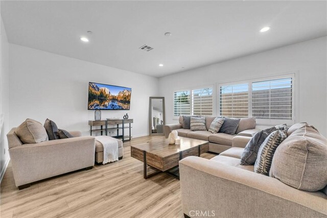 living room featuring light wood-type flooring