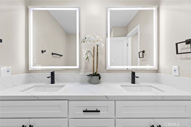 31002 Flying Cloud Dr, Laguna Niguel, CA 92677 - full bathroom with double vanity and a textured wall