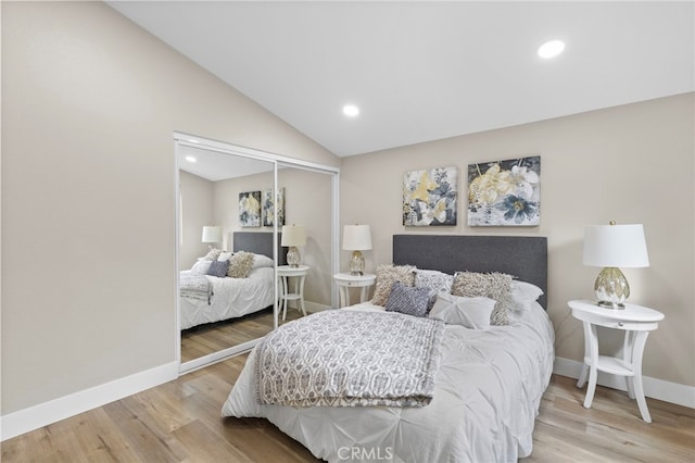 31002 Flying Cloud Dr, Laguna Niguel, CA 92677 - bedroom with light wood finished floors, a closet, vaulted ceiling, and recessed lighting