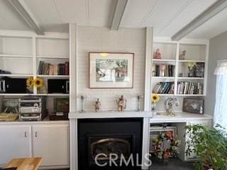 interior space featuring beam ceiling