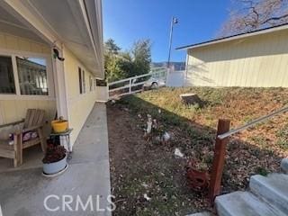 view of property exterior featuring fence