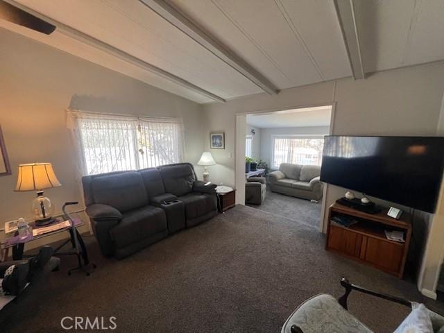 carpeted living area featuring lofted ceiling with beams