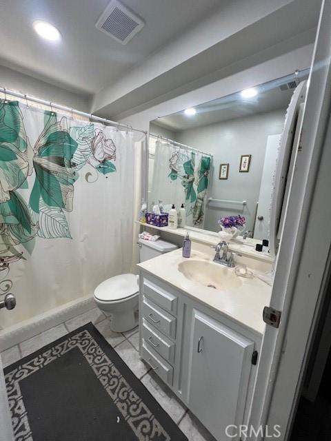 full bath with visible vents, a shower with shower curtain, toilet, vanity, and tile patterned floors