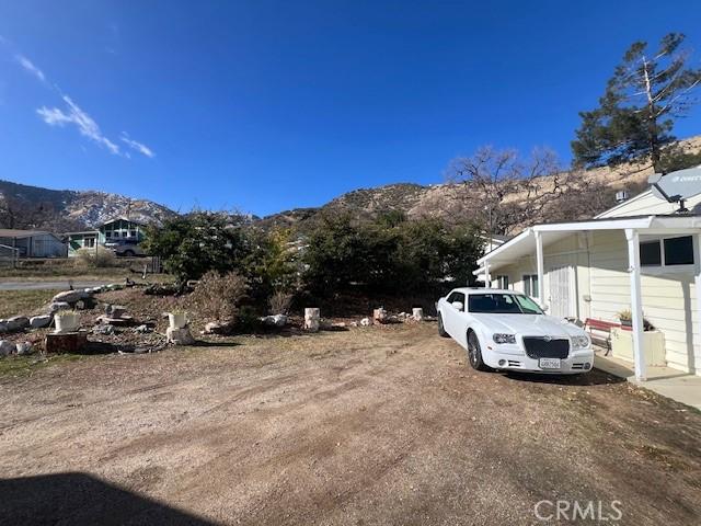 view of parking featuring a mountain view