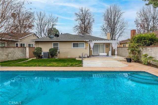 view of swimming pool with a patio, a pergola, a yard, and central air condition unit