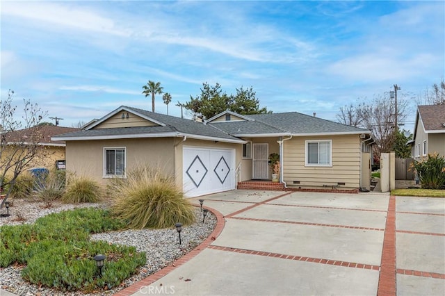 single story home with a garage