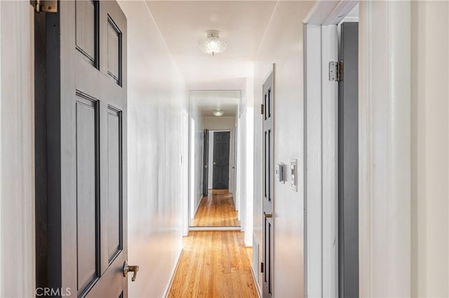 hall featuring light wood-type flooring