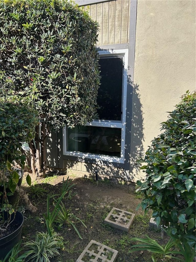 details featuring stucco siding