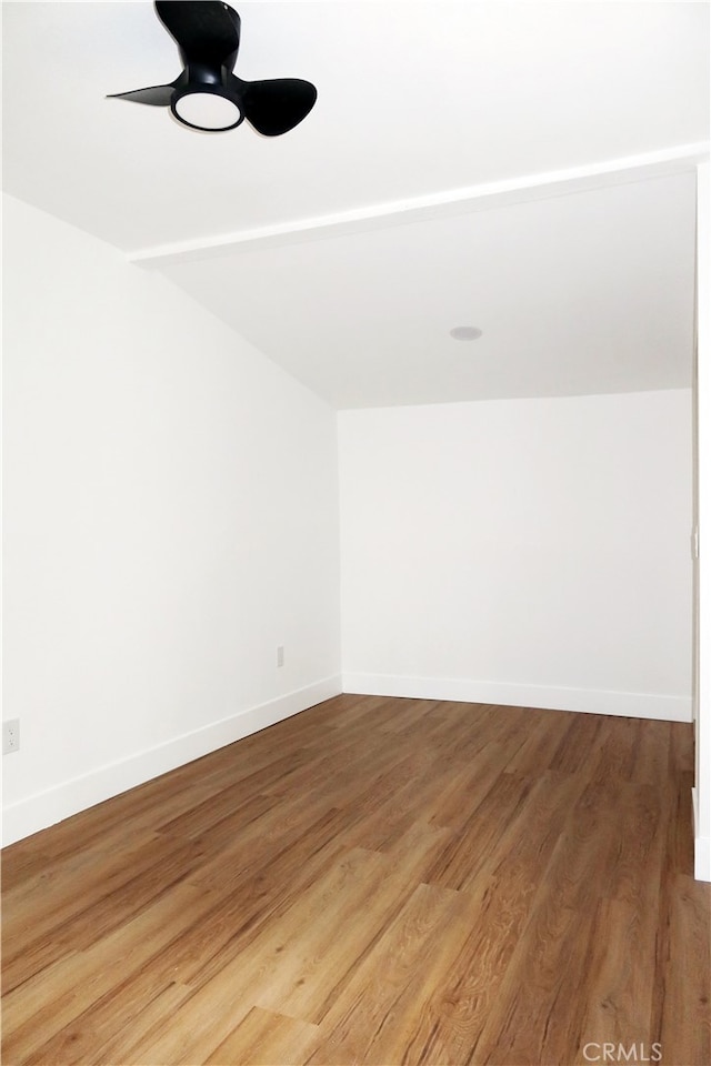 spare room featuring ceiling fan and wood-type flooring