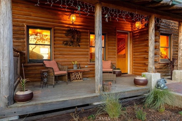 property entrance with covered porch