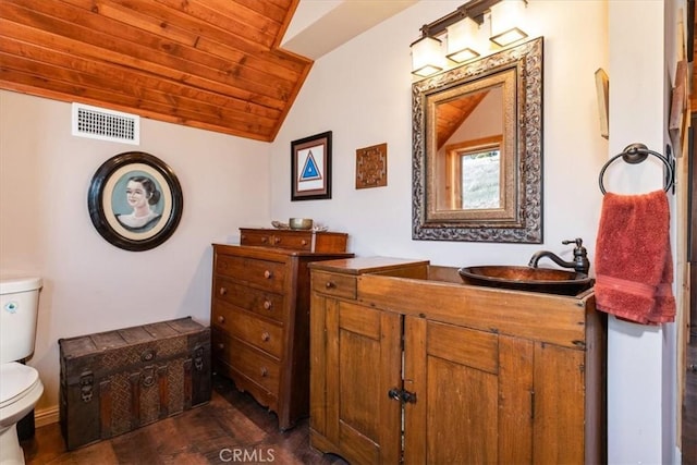 bathroom with visible vents, toilet, wooden ceiling, lofted ceiling, and vanity