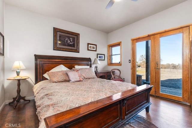 bedroom with access to exterior, baseboards, dark wood finished floors, and a ceiling fan