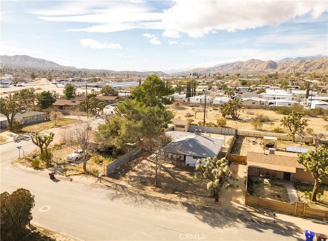 drone / aerial view featuring a mountain view