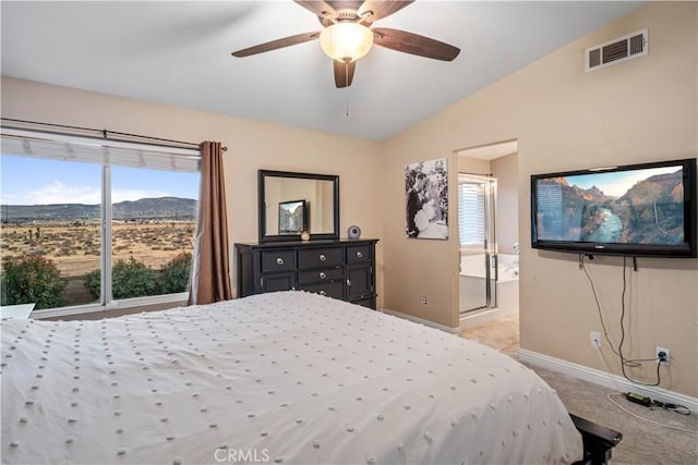 bedroom featuring lofted ceiling, light carpet, and ceiling fan