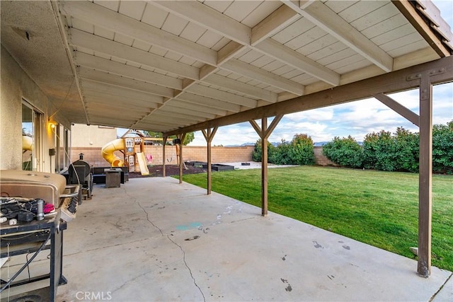 view of patio with a playground