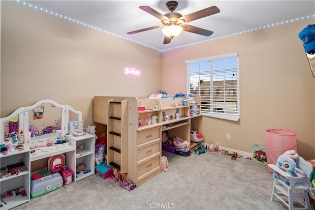 bedroom with ceiling fan and carpet