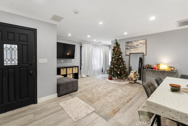 interior space with light hardwood / wood-style flooring