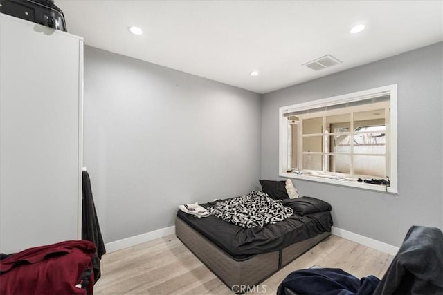 bedroom featuring light hardwood / wood-style flooring