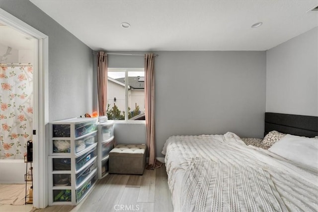 bedroom featuring light wood-type flooring