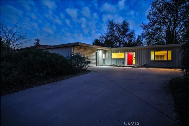 ranch-style home with a garage