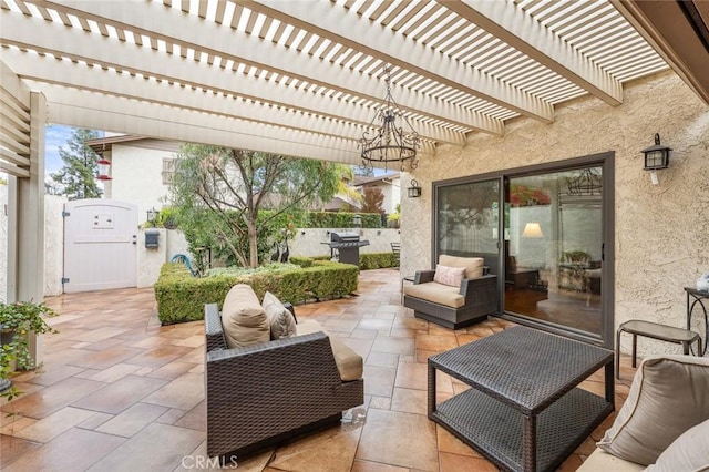 view of patio / terrace featuring a grill and a pergola