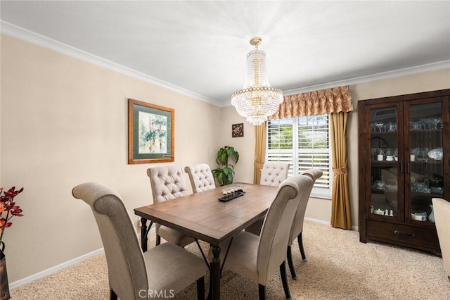 dining area with crown molding, light colored carpet, and an inviting chandelier