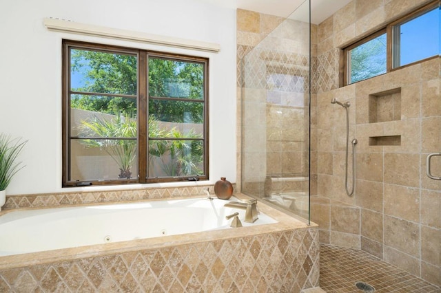 bathroom with tiled shower