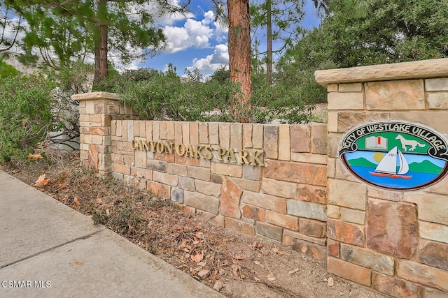 view of community sign