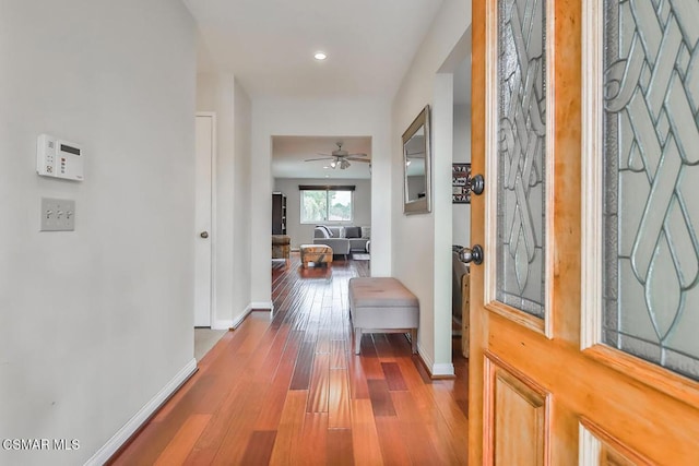 hallway featuring hardwood / wood-style flooring