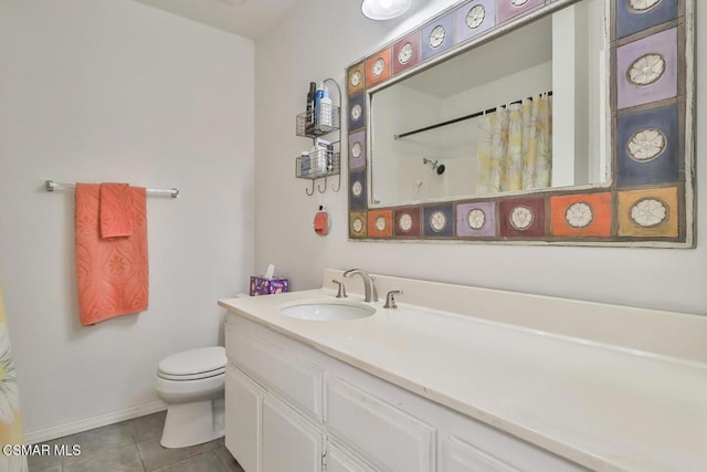 bathroom featuring vanity, curtained shower, tile patterned floors, and toilet