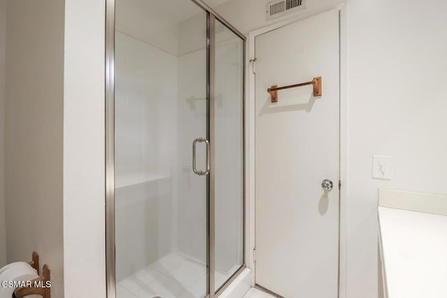 bathroom with walk in shower